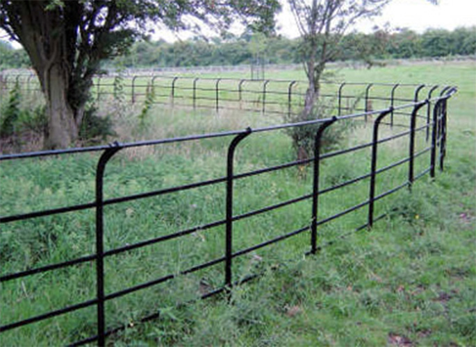 Traditional Stud Estate Fencing with Curved Top Rail